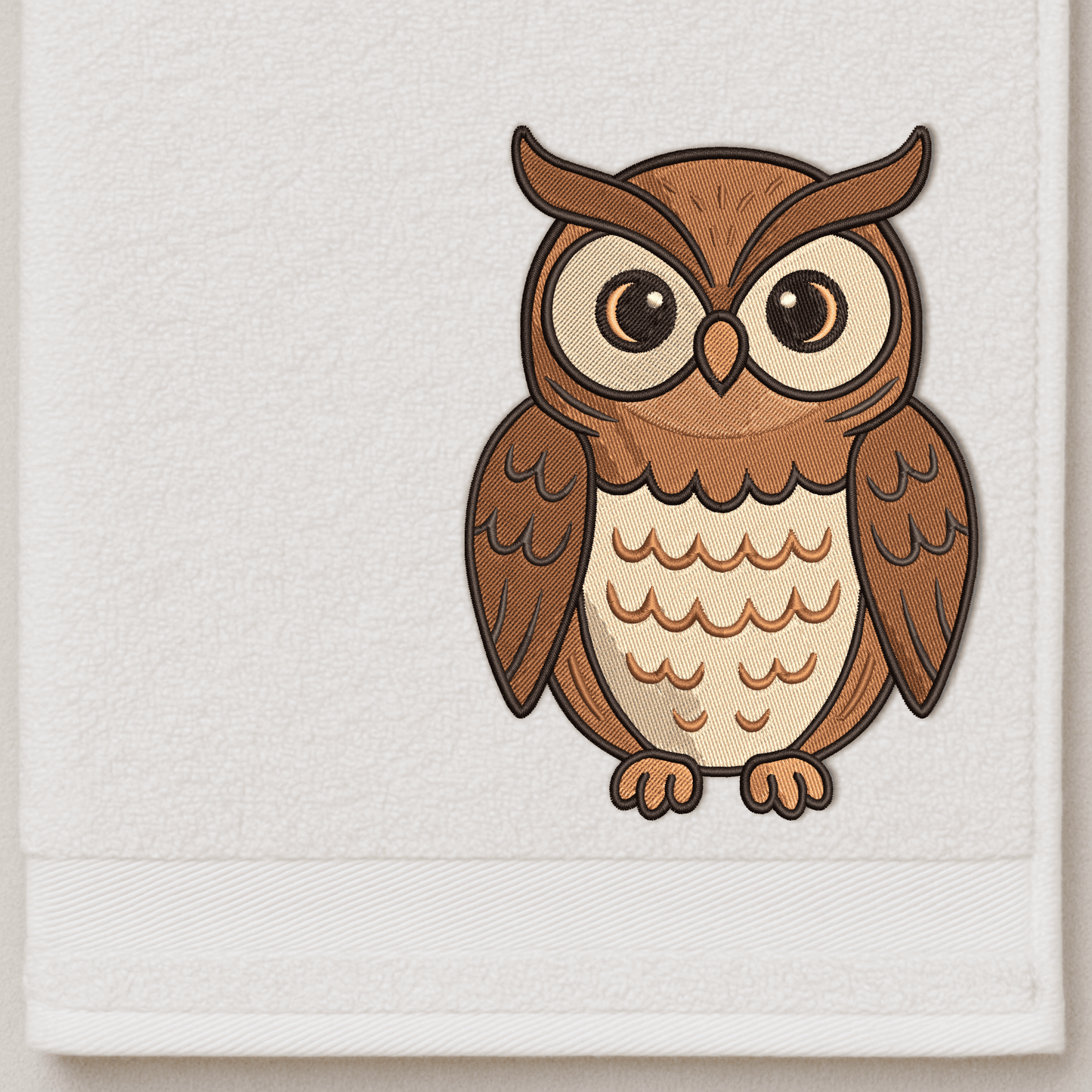 Machine embroidery of an owl bird