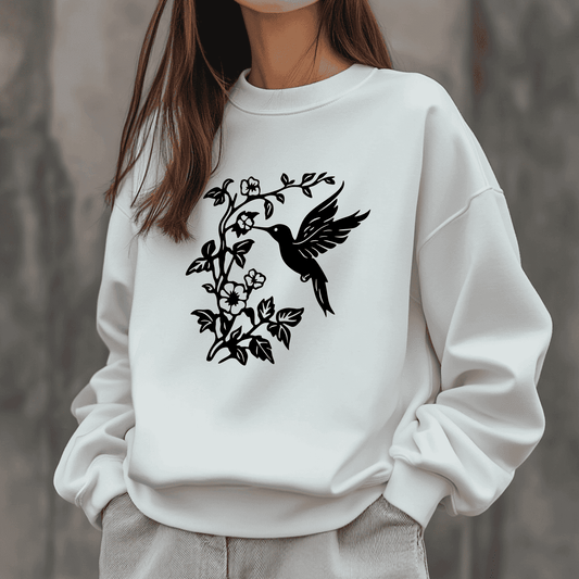 Hummingbird SVG cut file with floral branch