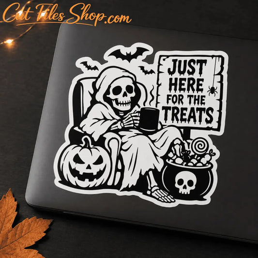Funny skeleton Halloween vinyl sticker displayed on a black laptop