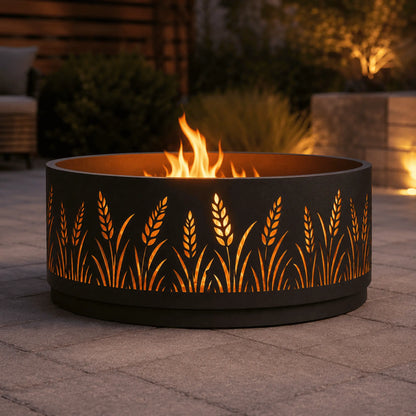 Round steel fire pit featuring a laser-cut wildflower pattern