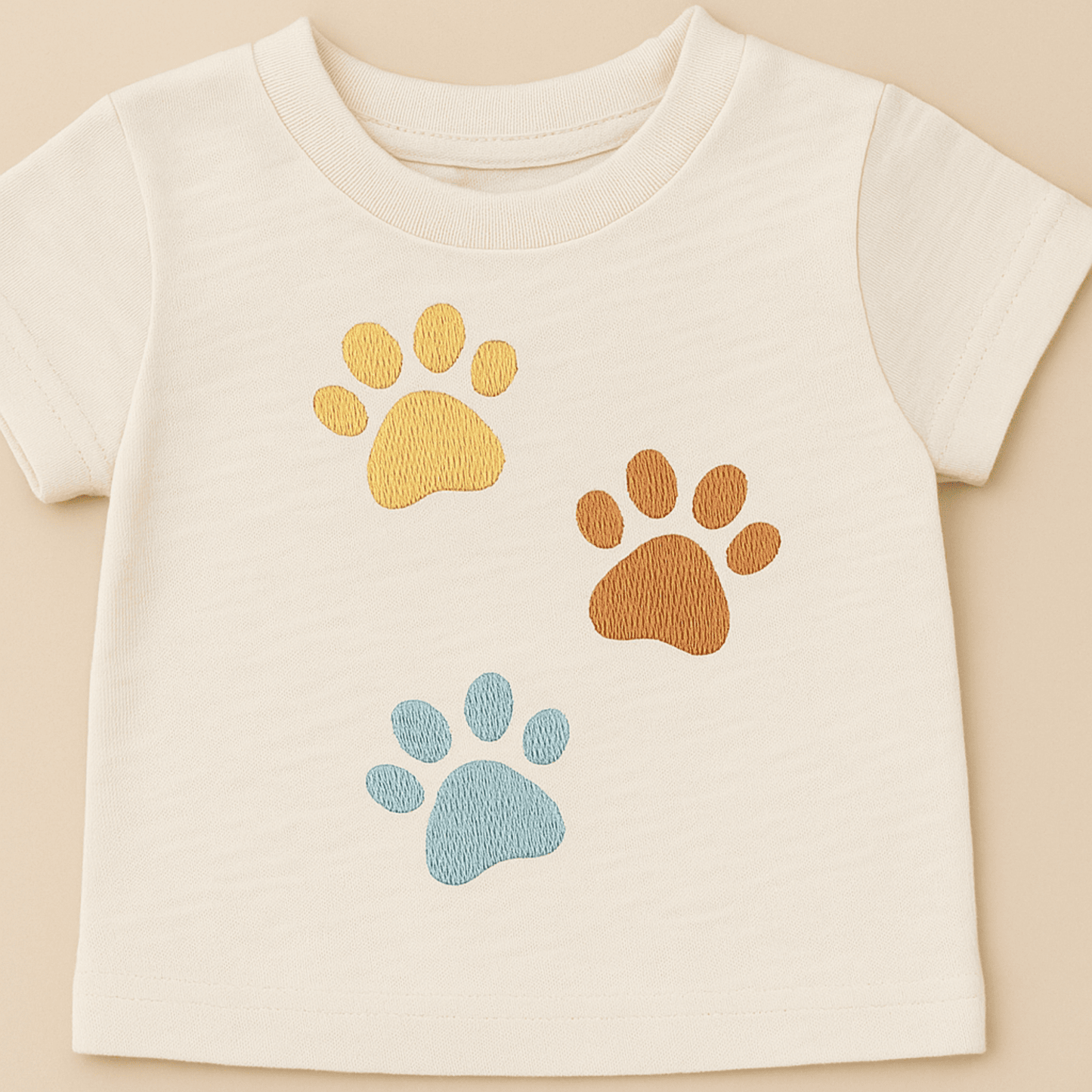 Pet lover embroidery applique featuring three multicolor paw prints
