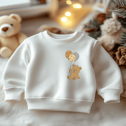 Baby embroidery design featuring teddy bear with three balloons