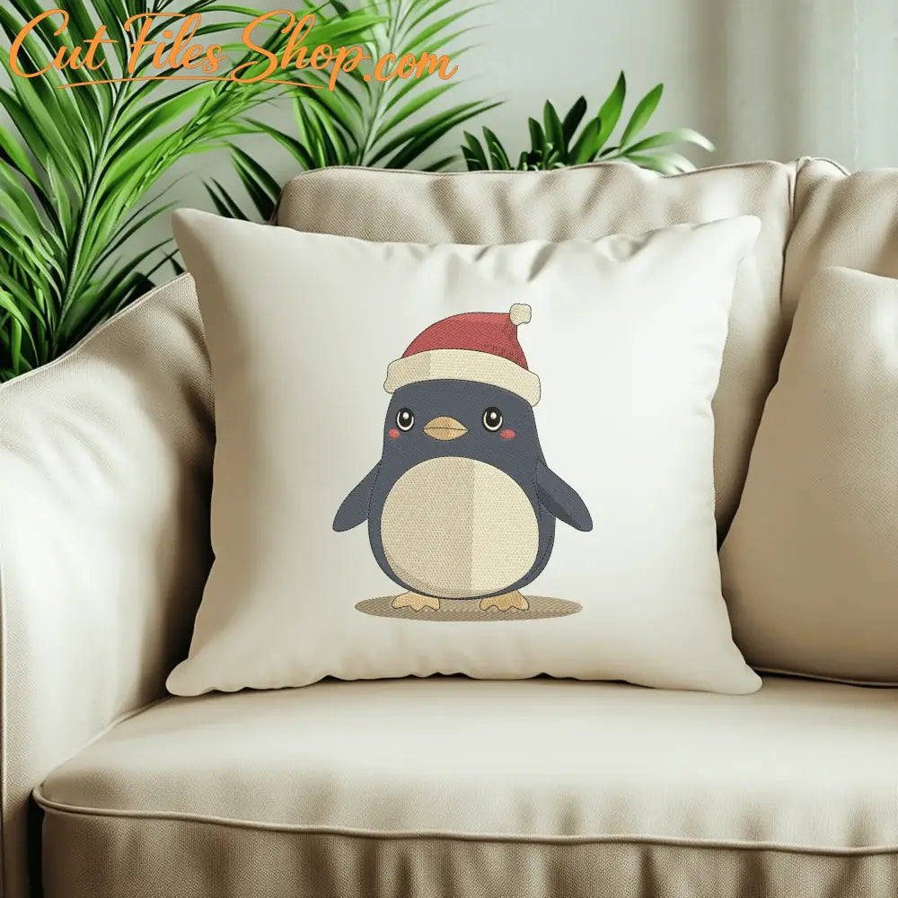 Festive Santa hat penguin machine embroidery design for stockings, pajamas, towels and pillows.