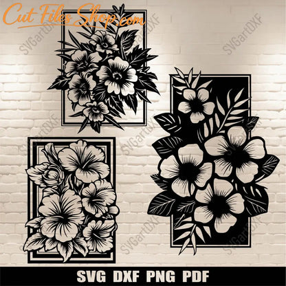 Three floral wall art designs with flowers and leaves extending beyond rectangular frames, shown in black on a light wall.