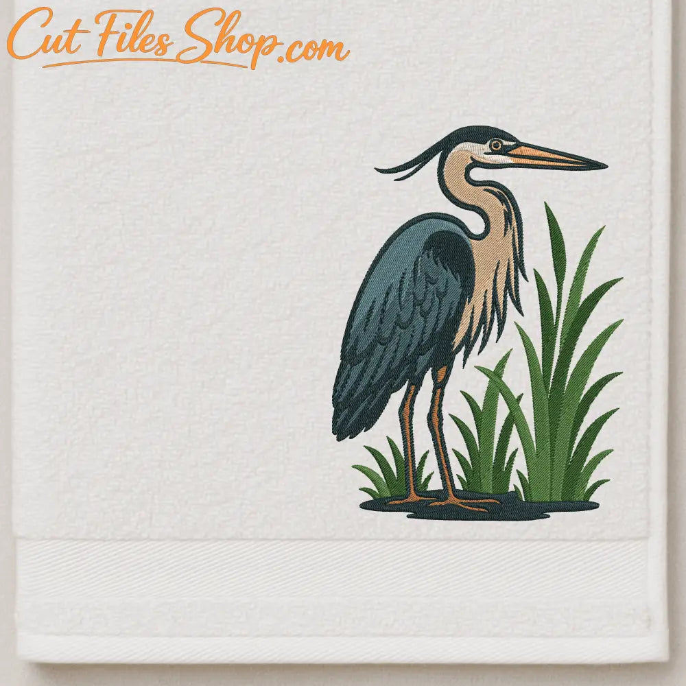 Embroidery of a heron in nature setting