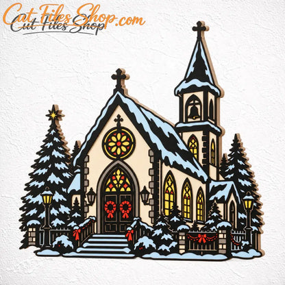 Painted plywood Christmas church displayed on a festive wooden table
