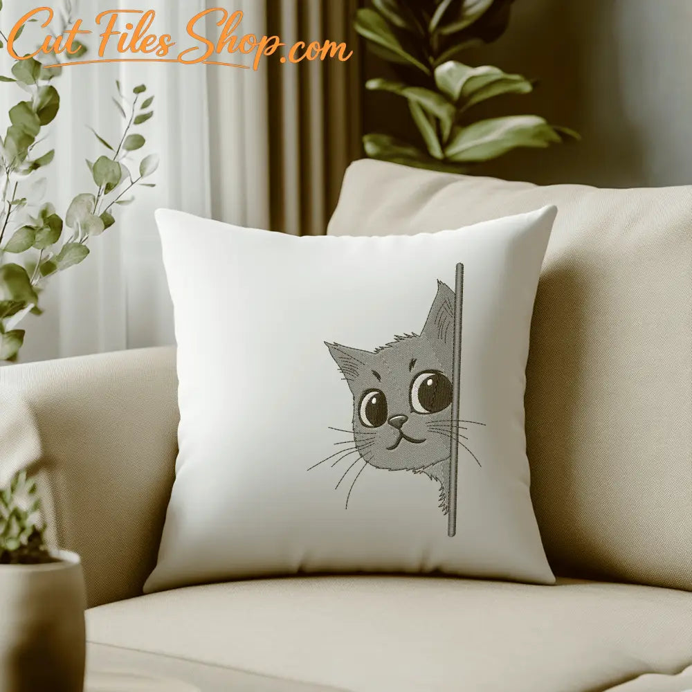 Machine embroidery of a peeking kitten