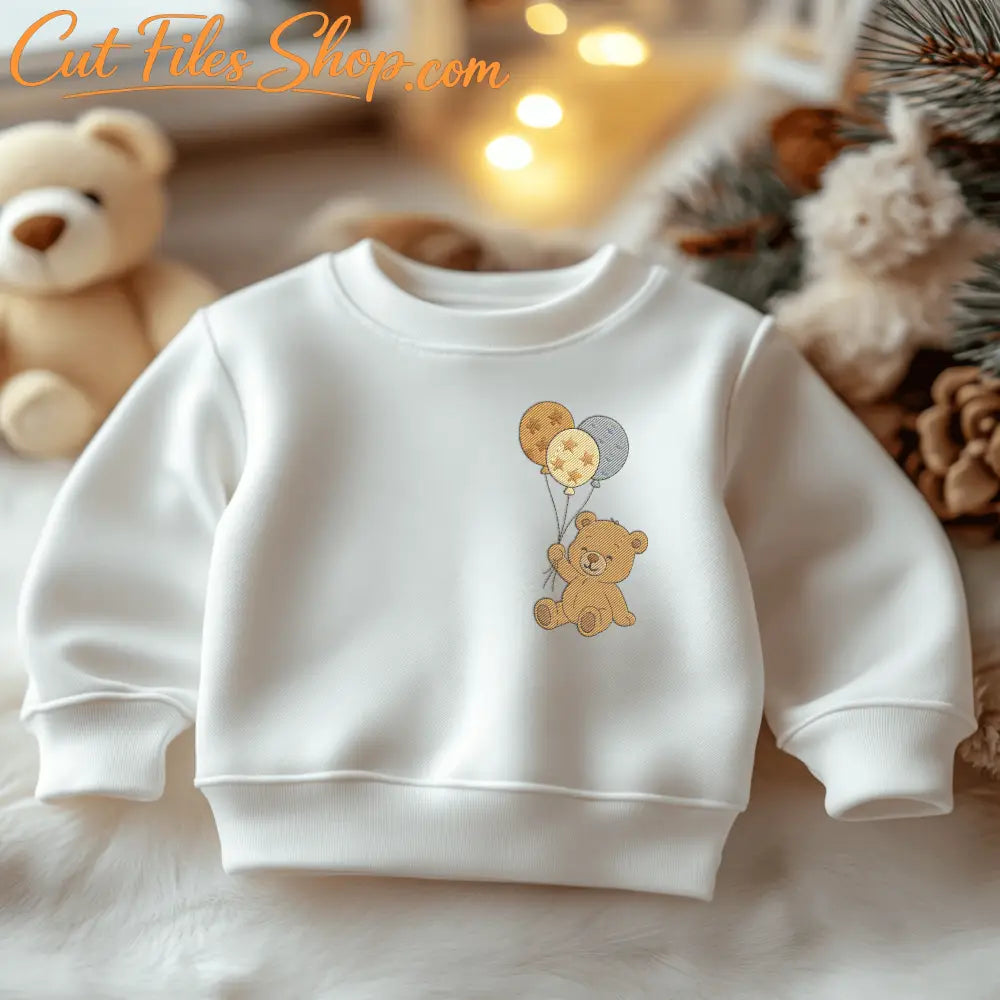 Baby embroidery design featuring teddy bear with three balloons